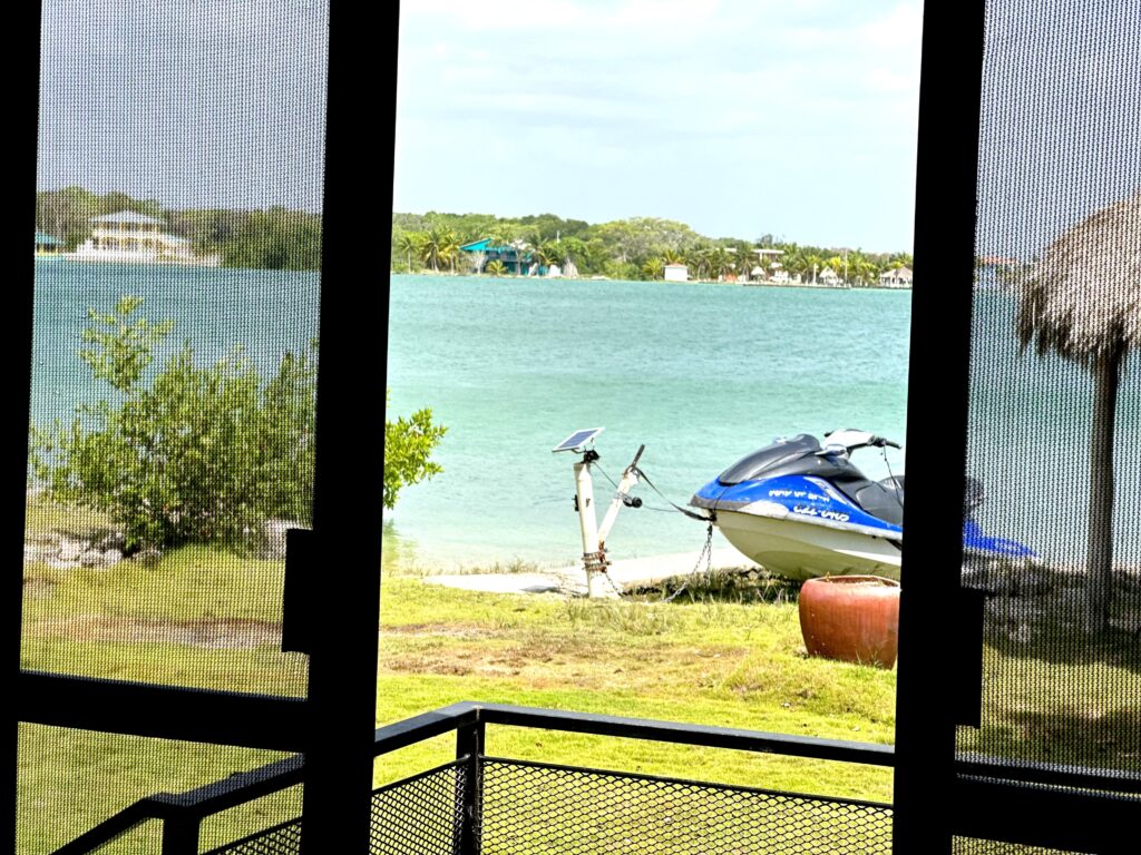 House in corozal, property, waterfront, seafront, oceanfront, boat, dock, home.